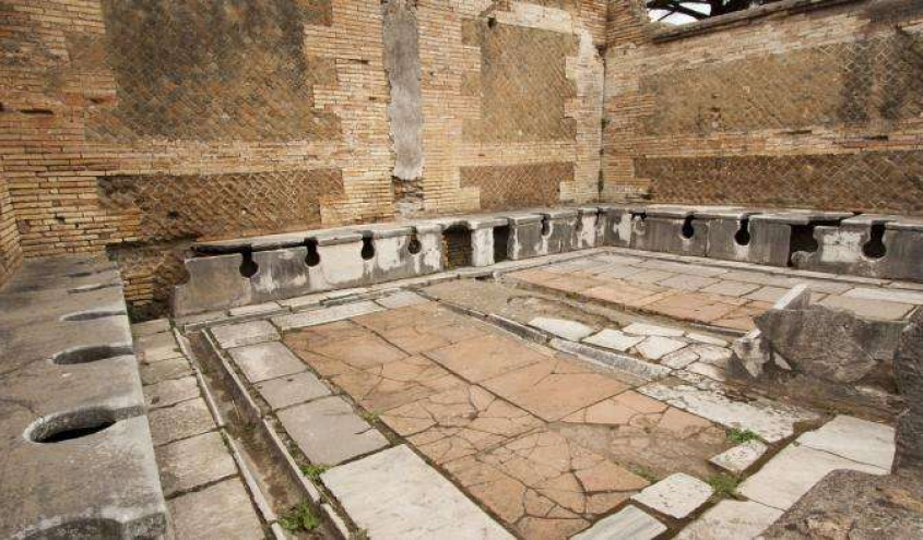 A picture showing the toilets and sewerage system in Ancient Rome.